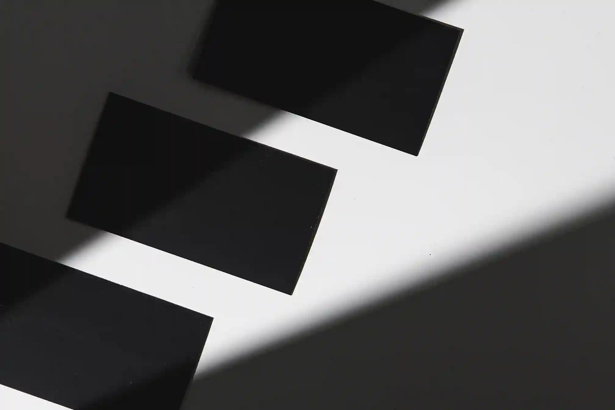 elegant-black-cards-with-harsh-light-and-shadows-2026-03-24-10-23-16-utc
